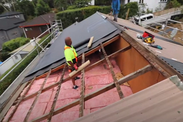 Carmel Roofing worker doing roof replacement